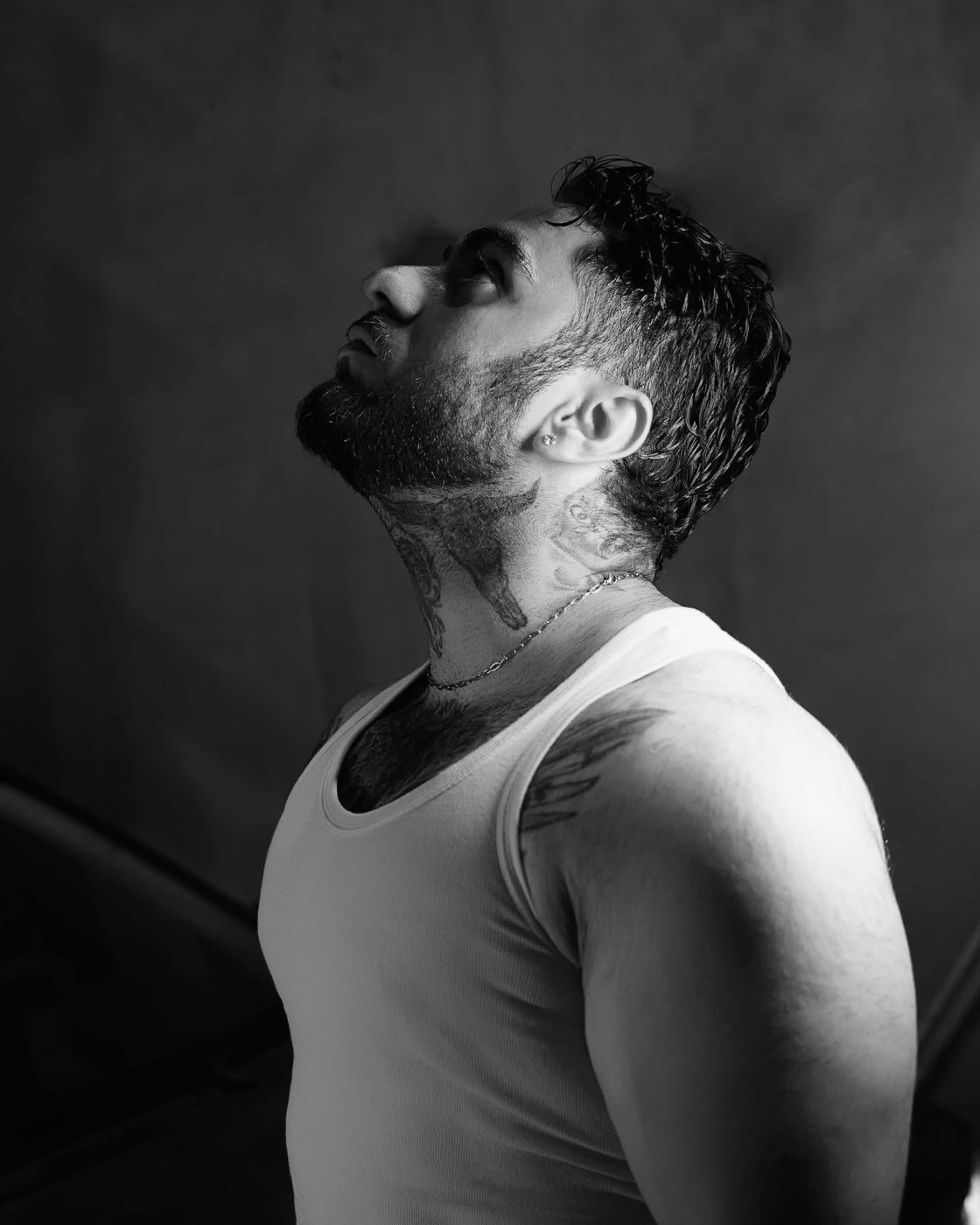 Parham Nowroozi, black and white profile portrait